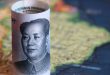 اليوان الصيني يتلون بالأحمر مقابل الدولار الأمريكي